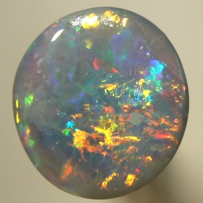SOLID SEMI BLACK OPAL Sparkling red and orange contrasted by blue and green, all bright